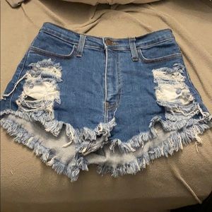 Women’s denim medium washed distressed shorts